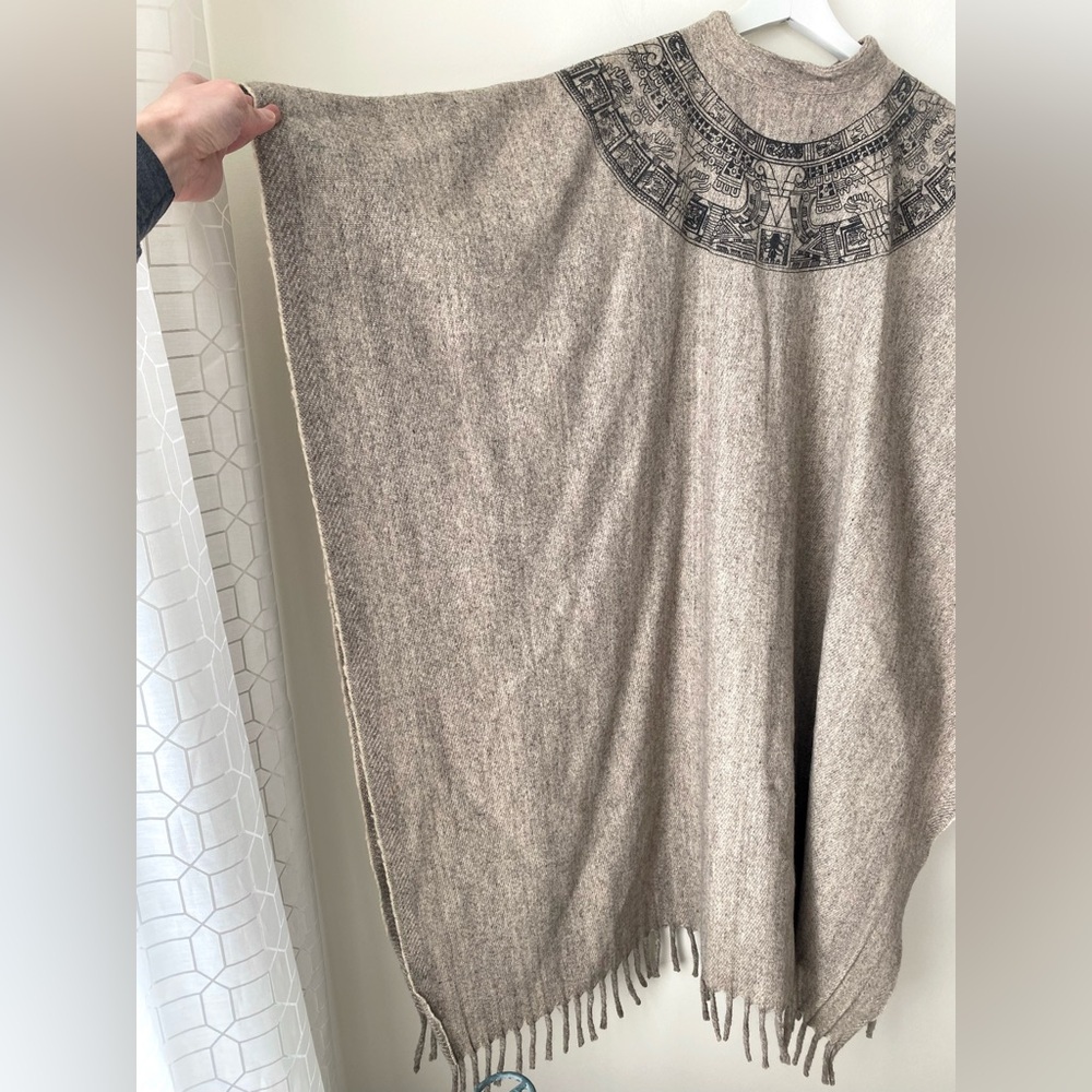 Fringed hem poncho with Egyptian-look print around collar - Picture 12 of 13